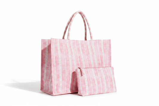 Pink striped tote bag on a white background